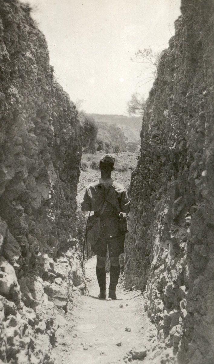 Soldier makes his way down a sap from No. 3 Outpost towards Russell's Top in the distance.